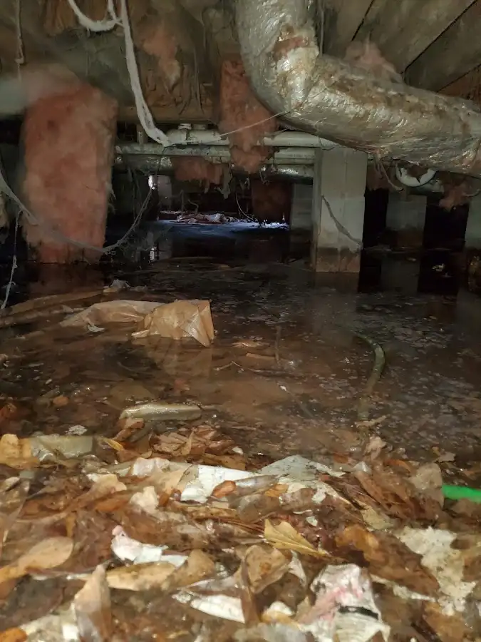 Crawl space flood assessment for Commercial Water Damage Restoration in Paramount