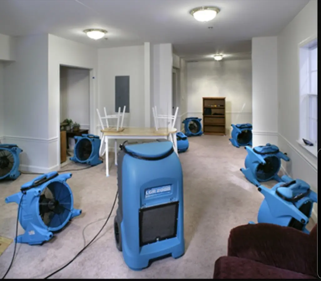 Air movers and dehumidifier setup for Water Damage Restoration in Paramount